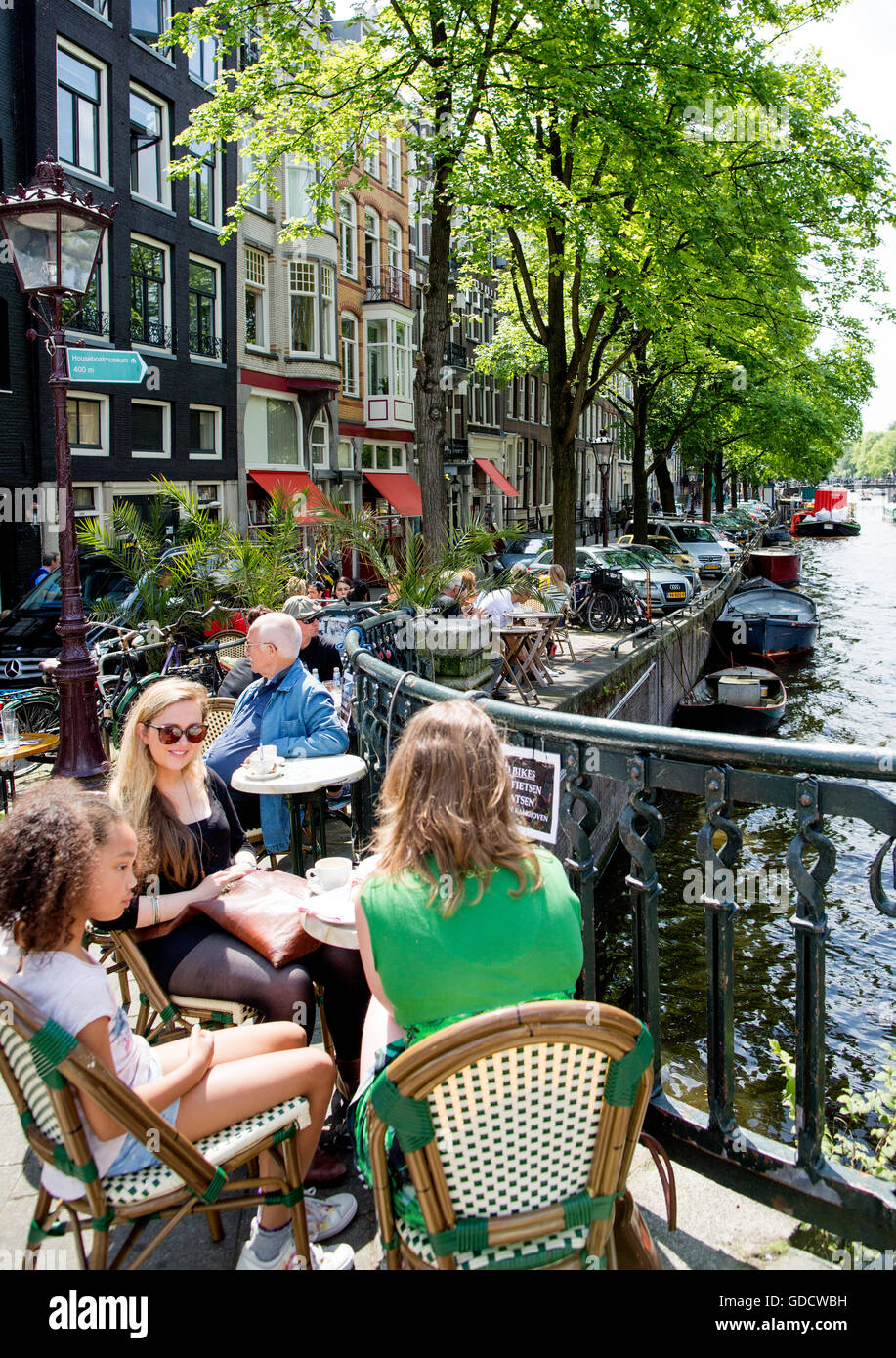 Street Cafe Restaurant By A Canal Amsterdam Holland Stock Photo
