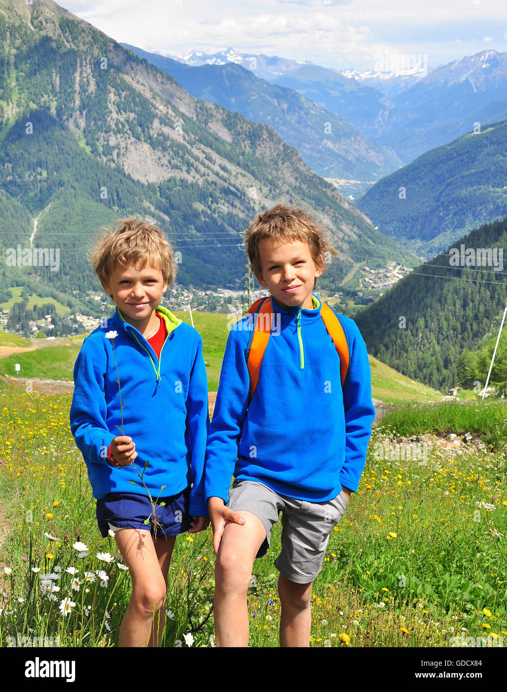 Two boys in mountains, Italy Stock Photo