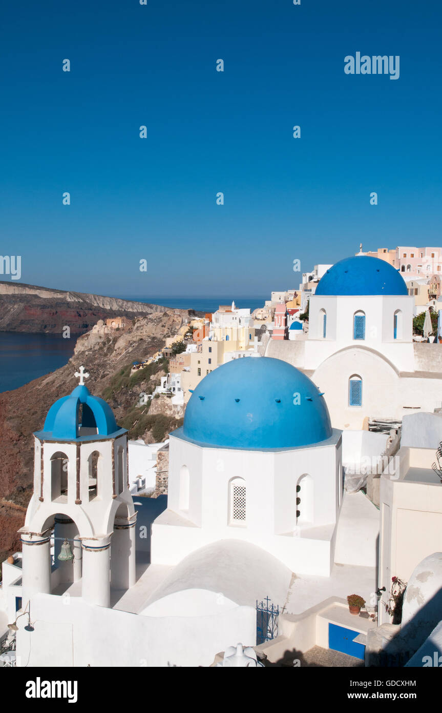 Greek village of Oia overlooking blue Aegean Sea, Santorini, Greece Stock Photo