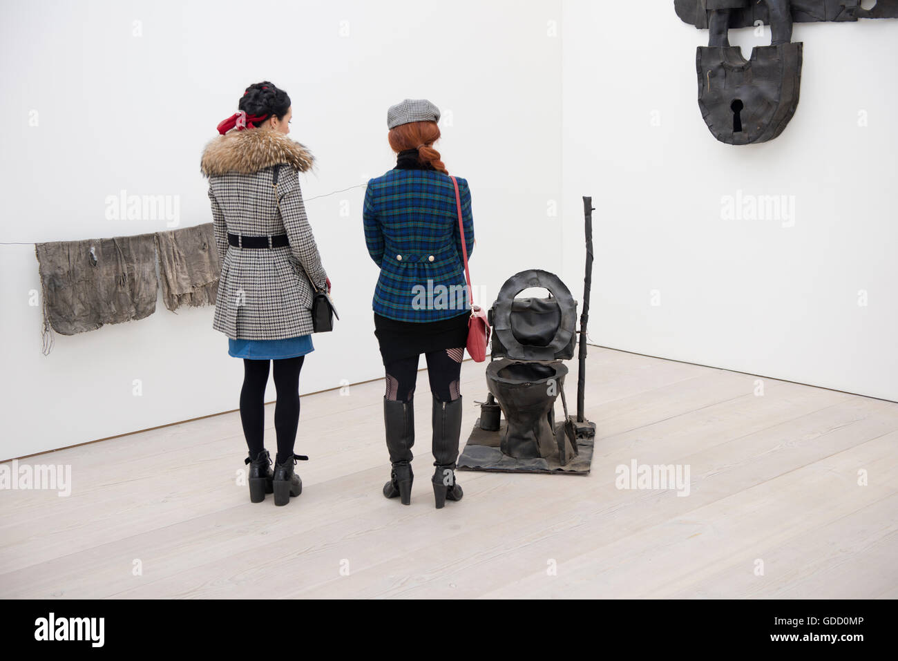 two women viewing contemporary art installation at saatchi gallery ...