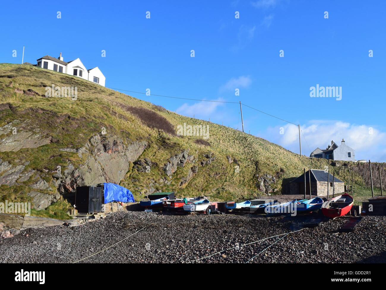 Fishing boats pulled up at Cove Harbour, Aberdeen, Scotland, UK Stock Photo