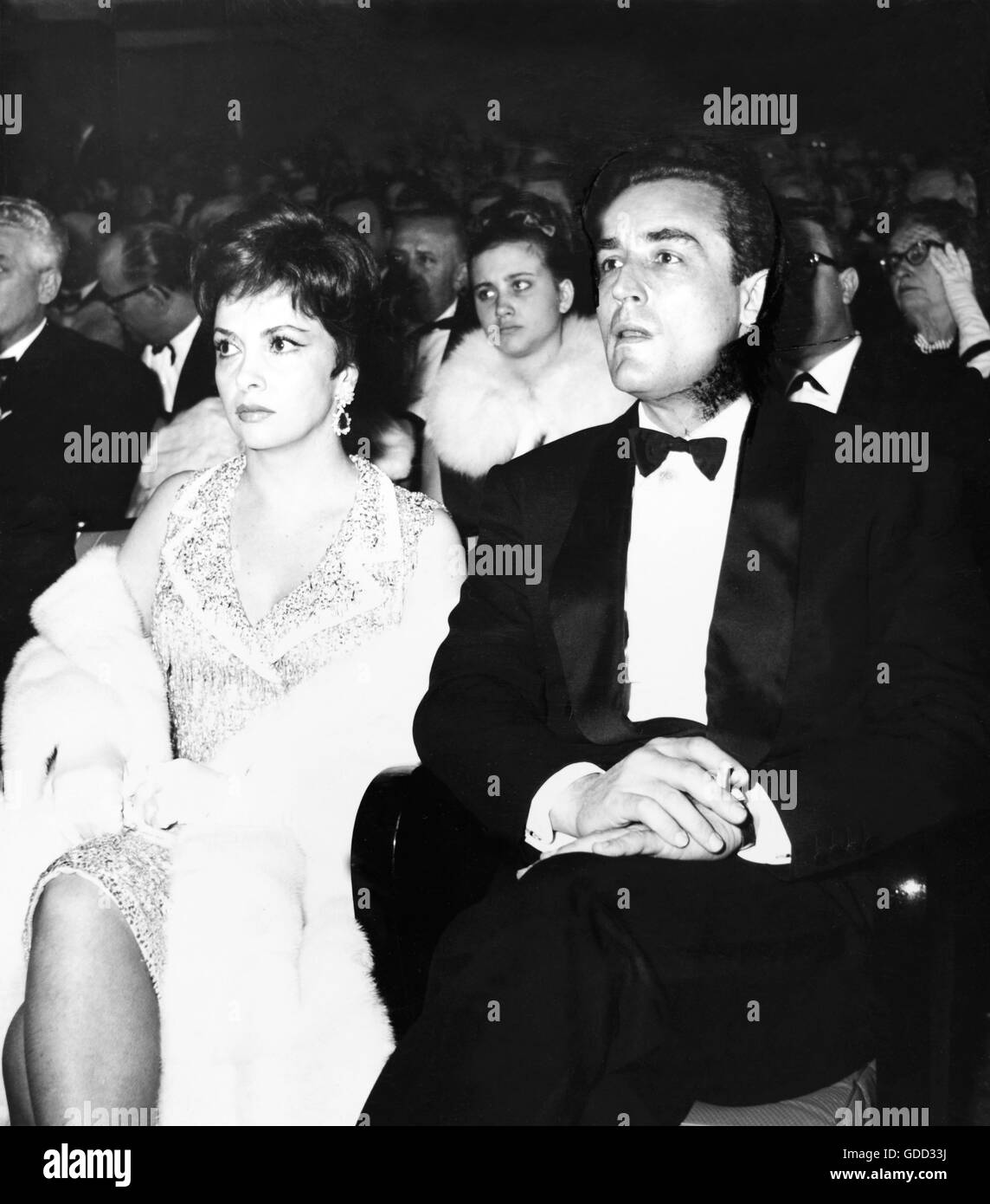 Lollobrigida, Gina, * 4.7.1927, Italian actress, half length, with Vittorio Gassmann, at premiere of the movie 'The Leopard' (Il gattopardo), 28.3.1963, Stock Photo