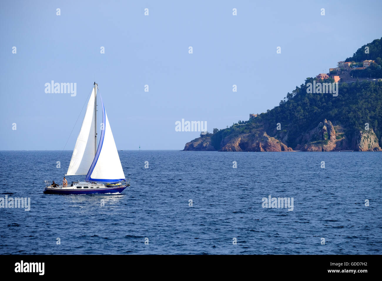 A sailing yacht heading back for port on the French Rivera Stock Photo