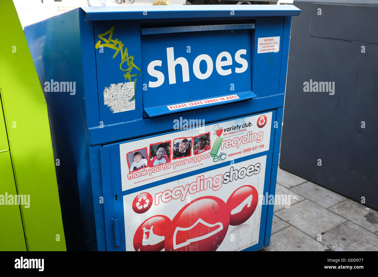 A clothes-recycling bin in London, England. Stock Photo