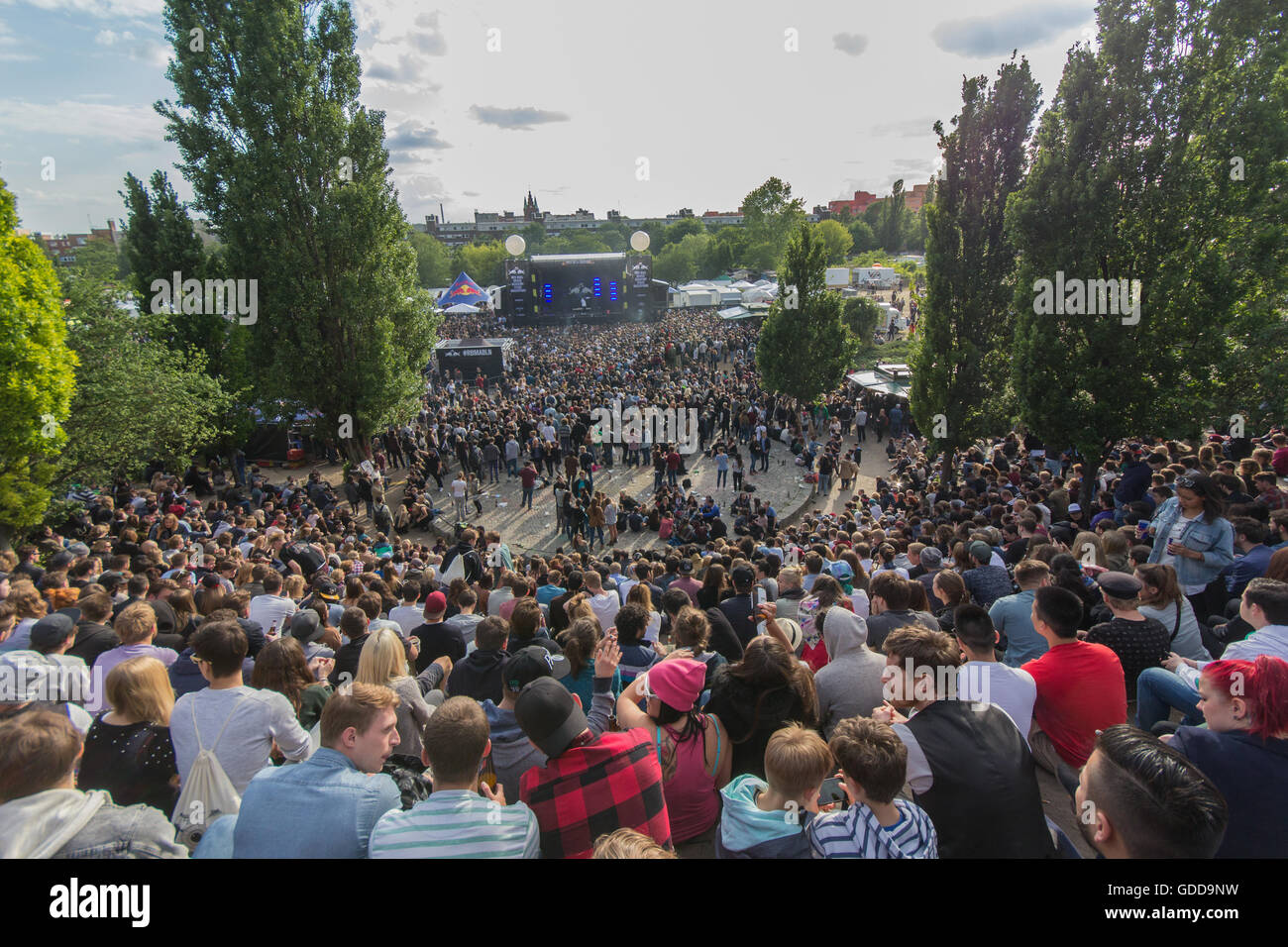 Many people in crowded park (Mauerpark) at 'fete de la musique'  in Berlin, Germany. Stock Photo