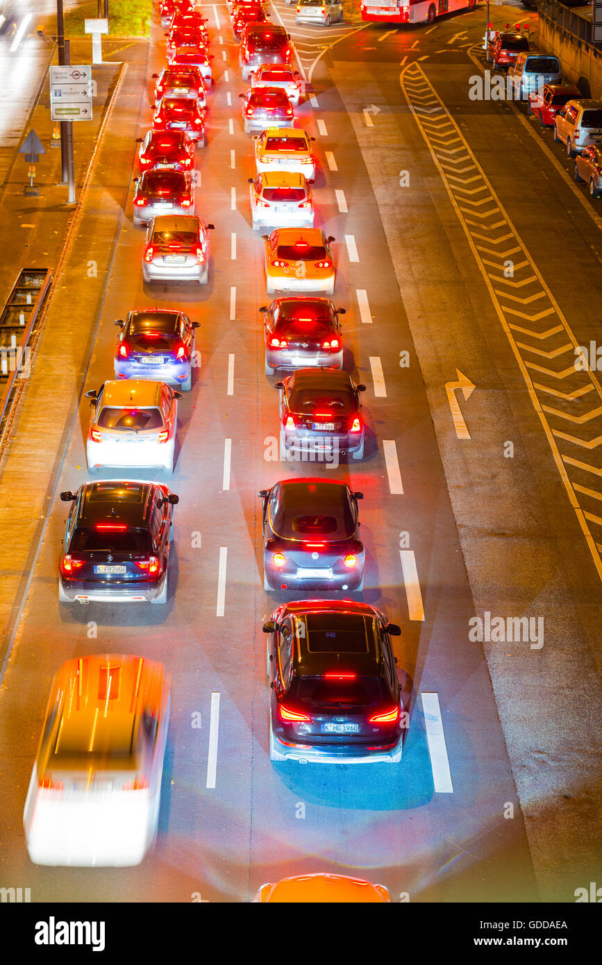 Cars,Automobiles,rush-hour,traffic,blur,brake lights,Germany,Europe,automobiles,Cologne,night,North Rhine-Westphalia, Stock Photo