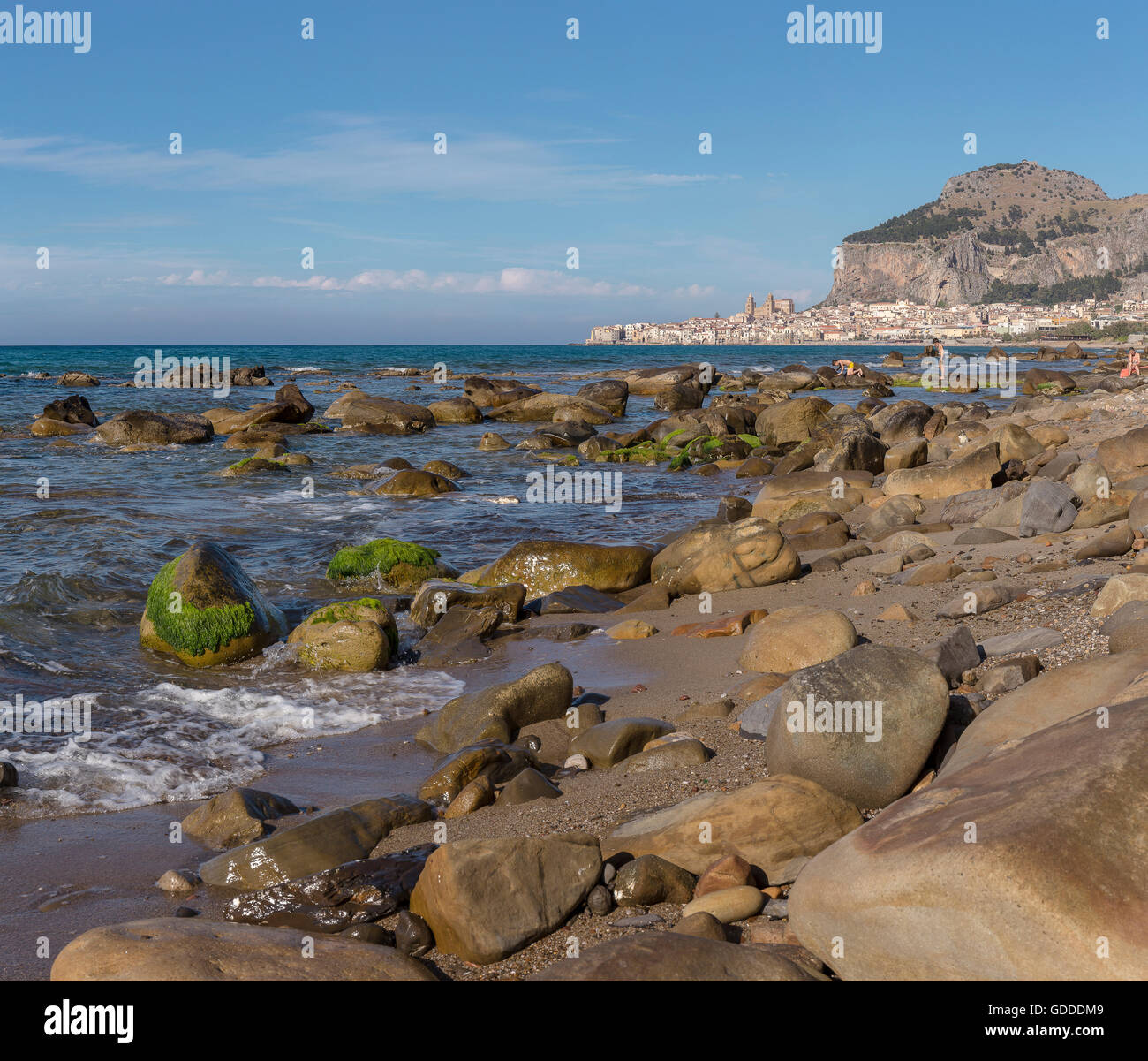 The city and the Rocca di Cefalu seen from the beach Stock Photo