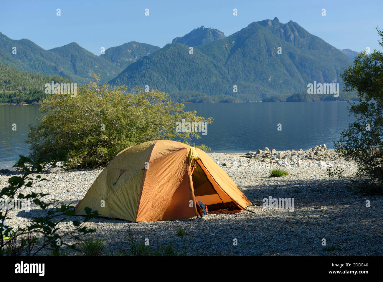 Tent on lake Stock Photo