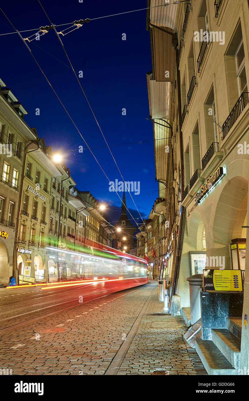 Bern,town,city,Switzerland,Europe,lights,traffic,dusk,twilight,blue hour,cars,automobiles,tram,streetcar,real esta Stock Photo