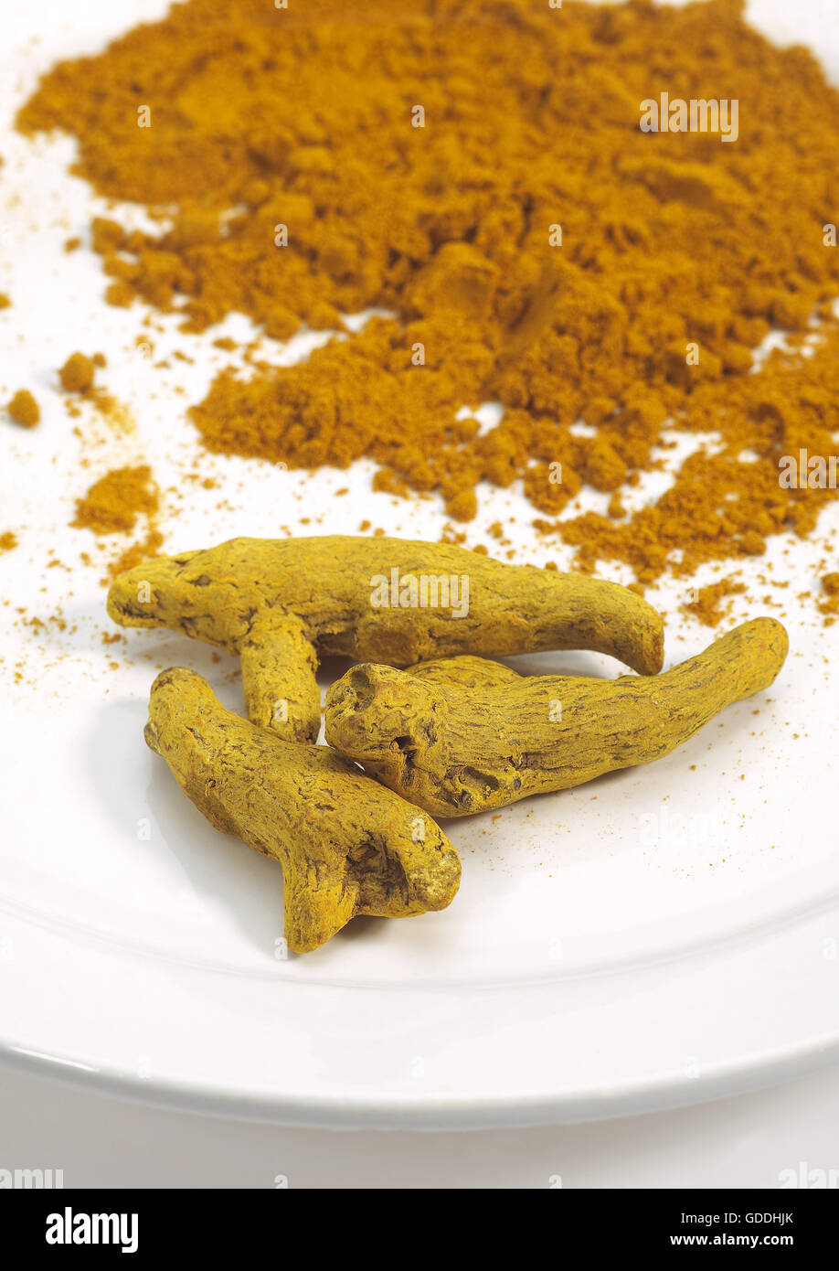 ROOT AND POWDER OF TURMERIC, AN INDIAN SPICE Stock Photo Alamy