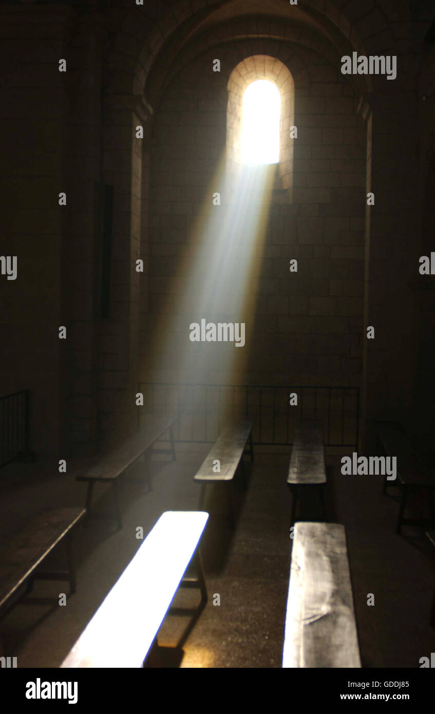 RAYS OF SUNLIGHT SHINING THROUGH WINDOW, CHURCH IN DROME, SOUTH EST OF FRANCE Stock Photo