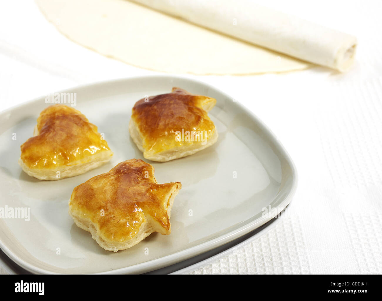 Crackers made with Puff or Flaky Pastry against White Background Stock Photo