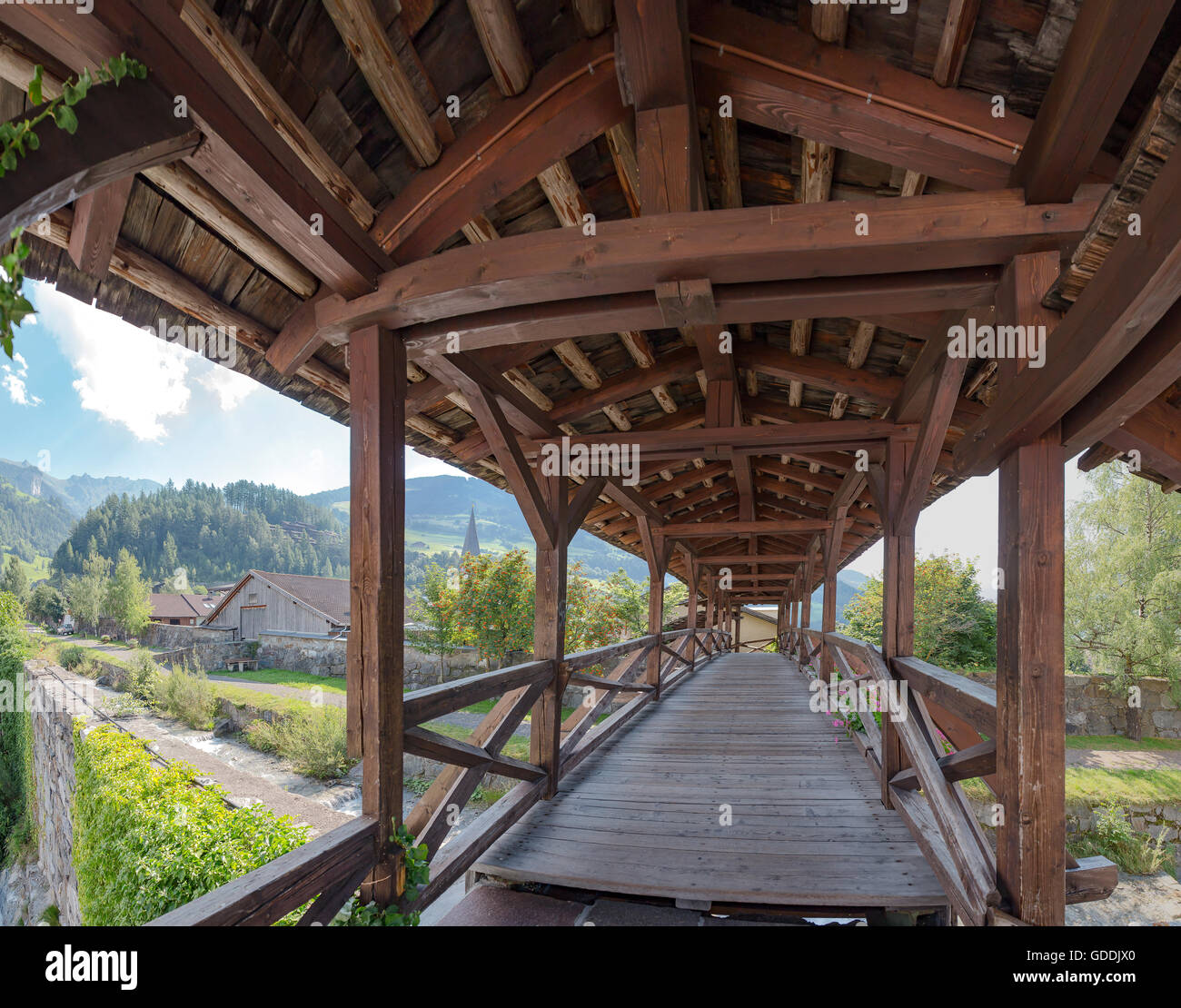 Matrei in Osttirol,Austria,Covered wooden footbridge over the Bretterwandbach Stock Photo