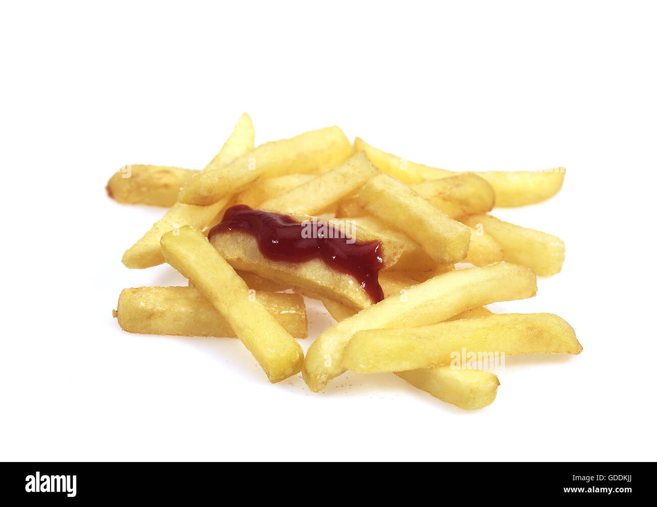 French Fries and Tomato Sauce against White Background Stock Photo