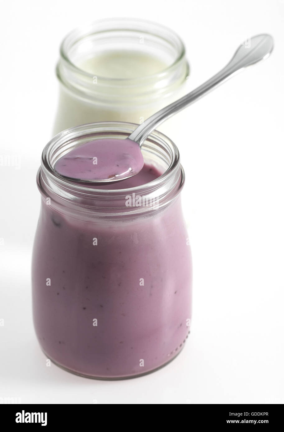 Pot of Yogurt against White Background Stock Photo Alamy