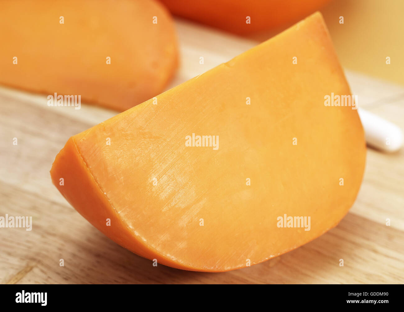 French Cheese called Mimolette, Cheese made with Cow's Milk Stock Photo