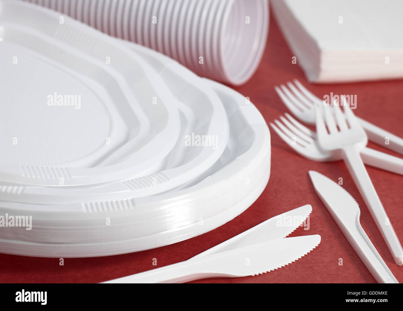 PLASTIC PLACE SETTING AND PAPER NAPKIN Stock Photo