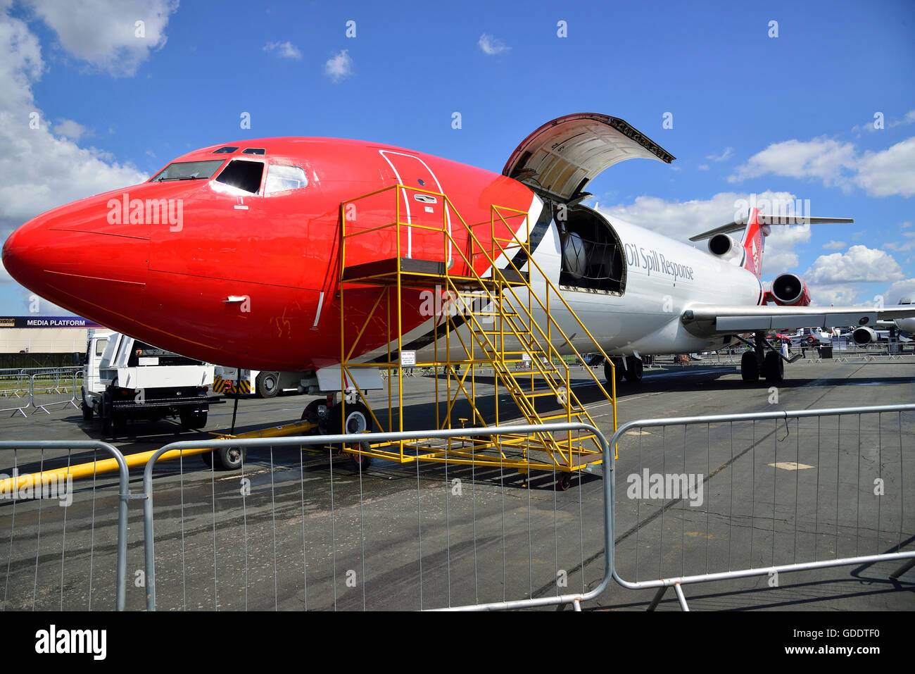 Farnborough, Hampshire, UK. 14th July, 2016. Day 4 of the Farnborough International  Airshow. Boeing's 727 adapted for Oil Spill Response  with  its spray system fitted underneath at the rear.  Oil Spill Response travels worldwide responding to industry oil spillage  Friday 15th celebrates  the centenary of the Boeing company. Credit:  Wendy Johnson/Alamy Live News Stock Photo