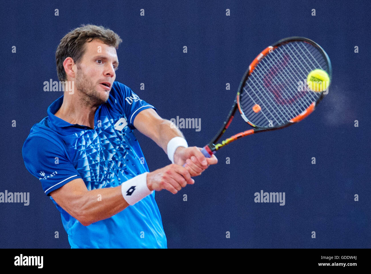Hamburg, Germany. 15th July, 2016. France's Paul-Henri Mathieu in action against Pablo Cuevas of Uruguay during their quarter final match at the German Tennis Championships in Hamburg, Germany, 15 July 2016. Photo: DANIEL BOCKWOLDT/dpa/Alamy Live News Stock Photo