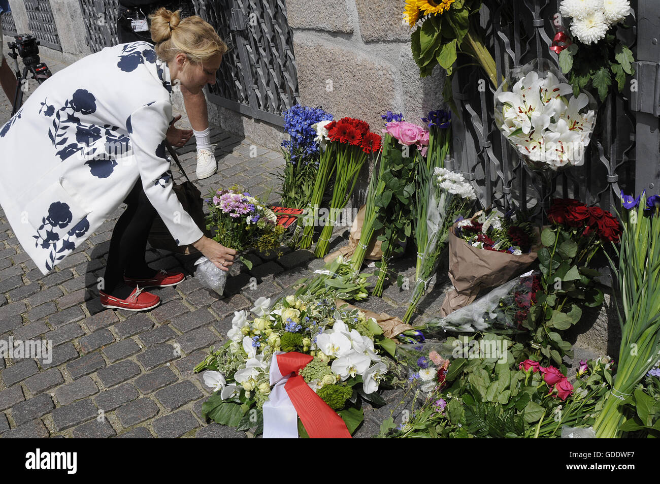 Copenhagen, Denmark. 15th July, 2016.Ms.Zania Stampe danish female politician fromdanish radical libery party pays tribute to French victims laying flowers at French Embassy in Copenhagen Denmark among other dane pat ribune to france and french flag is at half mast at French Embassy due o nice victims on french national day bestal day in Nice . Credit:  Francis Joseph Dean/Dean Pictures/Alamy Live News Stock Photo