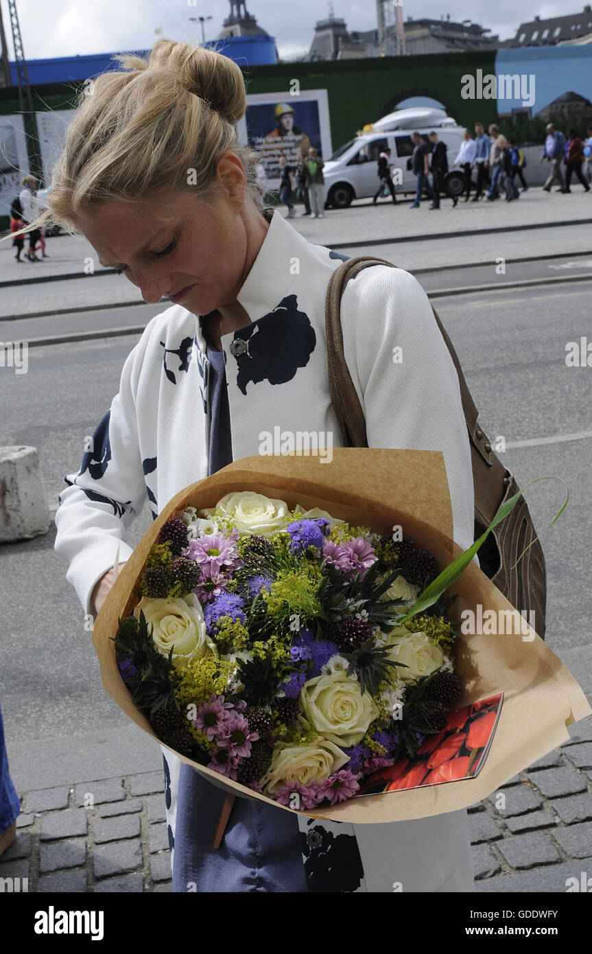 Copenhagen, Denmark. 15th July, 2016.Ms.Zania Stampe danish female politician fromdanish radical libery party pays tribute to French victims laying flowers at French Embassy in Copenhagen Denmark among other dane pat ribune to france and french flag is at half mast at French Embassy due o nice victims on french national day bestal day in Nice . Credit:  Francis Joseph Dean/Dean Pictures/Alamy Live News Stock Photo