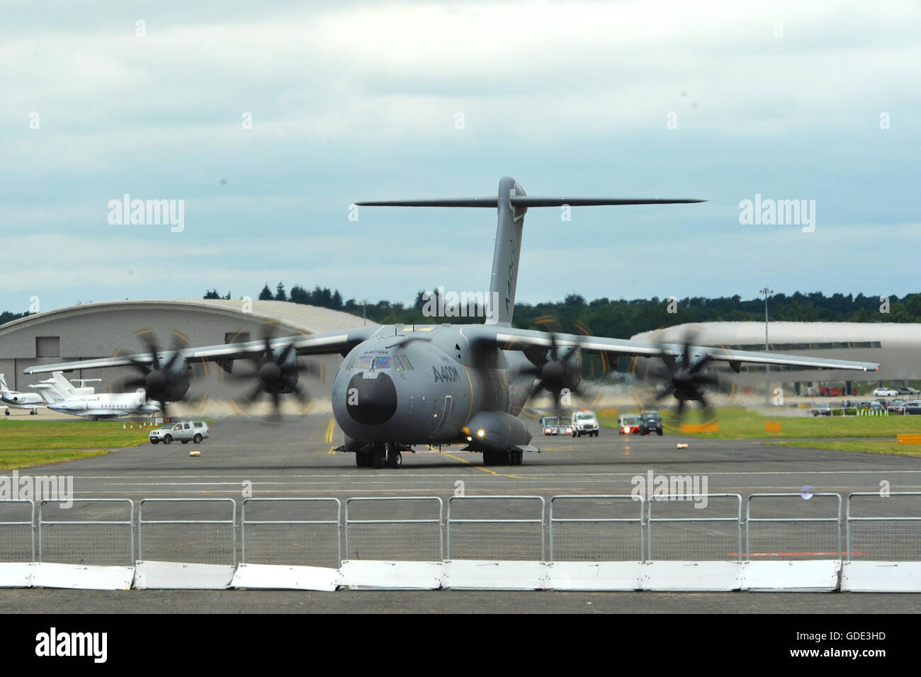 Farnborough, UK. 15th July, 2016. An Airbus A400M Atlas taxiing to take off at the Farnborough International Airshow (FIA) which took place today in Farnborough, UK.  The air show, a biannual showcase for the aviation industry, is the biggest of it's kind and attracts civil and military buyers from all over the world. trade visitors are normally in excess of 100,000 people. The show runs until July 17. Credit:  Michael Preston/Alamy Live News Stock Photo