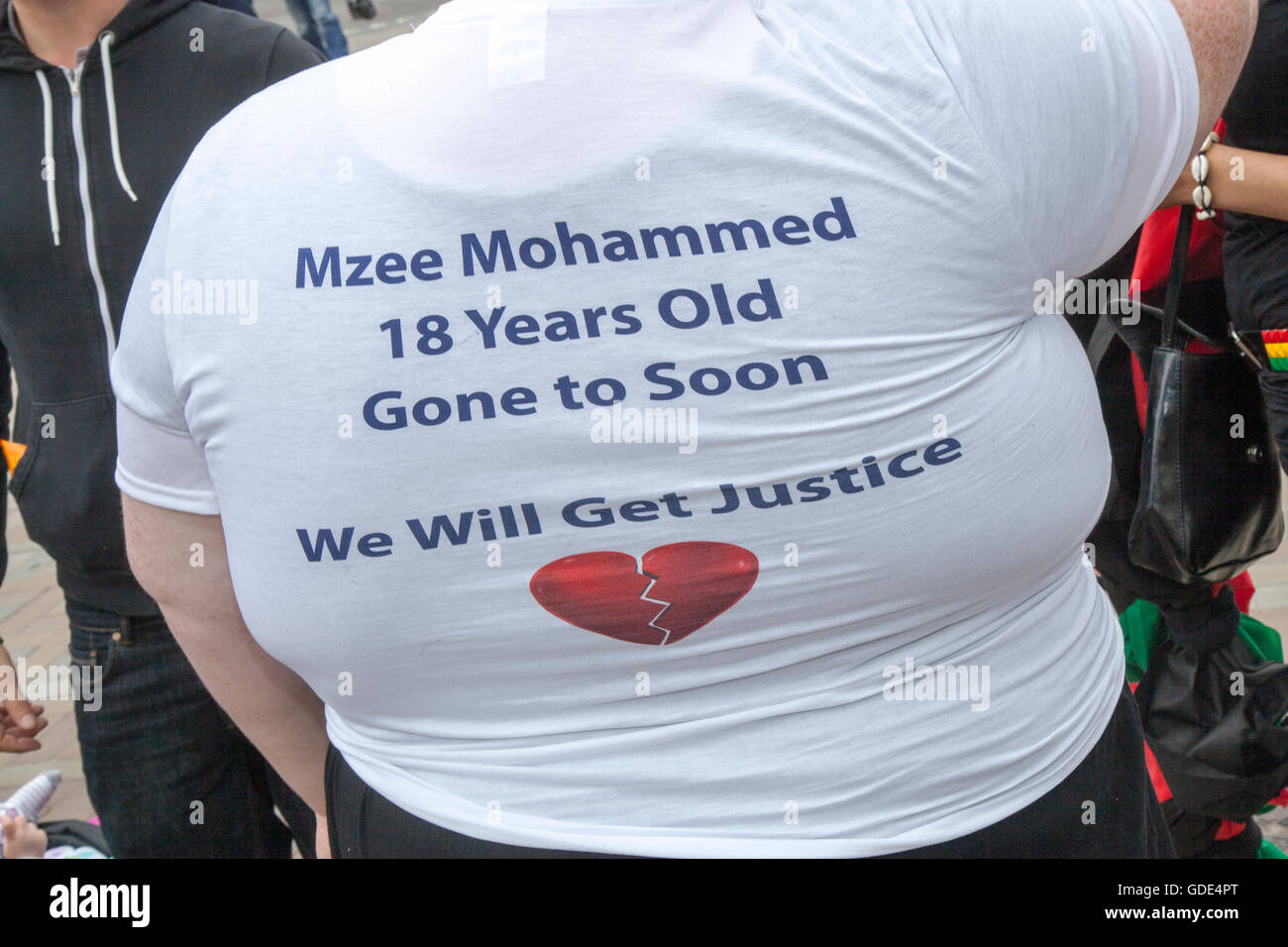 Liverpool, Merseyside, UK. 16th July, 2016. Mzee Mohammed Protest.  Family and mourners protest through the streets of Liverpool after the death of 18yr old Mzee Mohammed, whilst in police custody.  The youth was allegedly seen 'behaving erratically' in the Liverpool One shopping centre by security staff.  The IPCC have begun an investigation into the teens untimely death.  Credit:  Cernan Elias/Alamy Live News Stock Photo