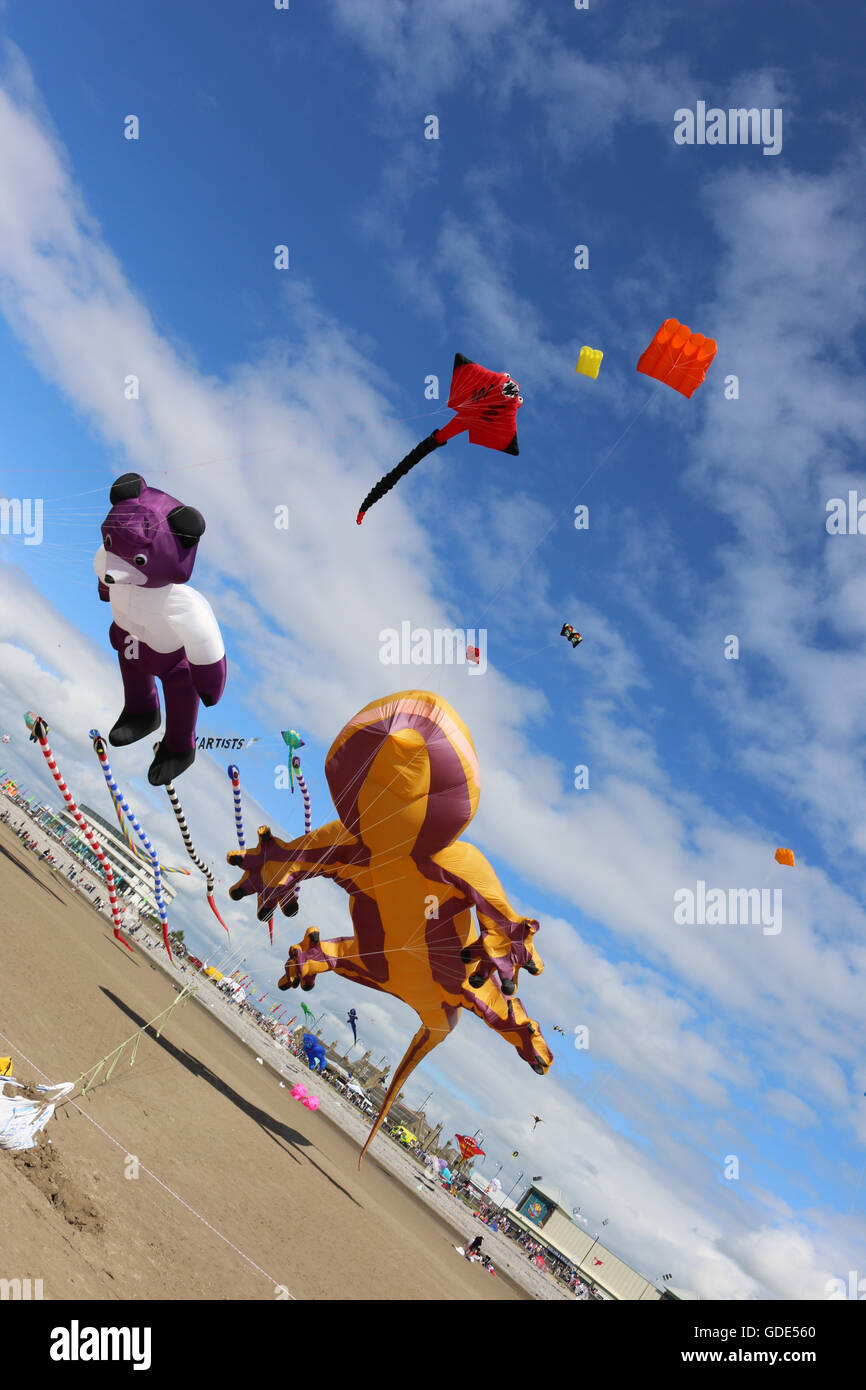 Morecambe Promenade, Morecambe, Lancashire, UK. 16th July 2016.  The annual Catch the Wind Kite festival took place this afternoon on Morecambe In front of the Midland Hotel. Credit:  David Billinge/Alamy Live News Stock Photo