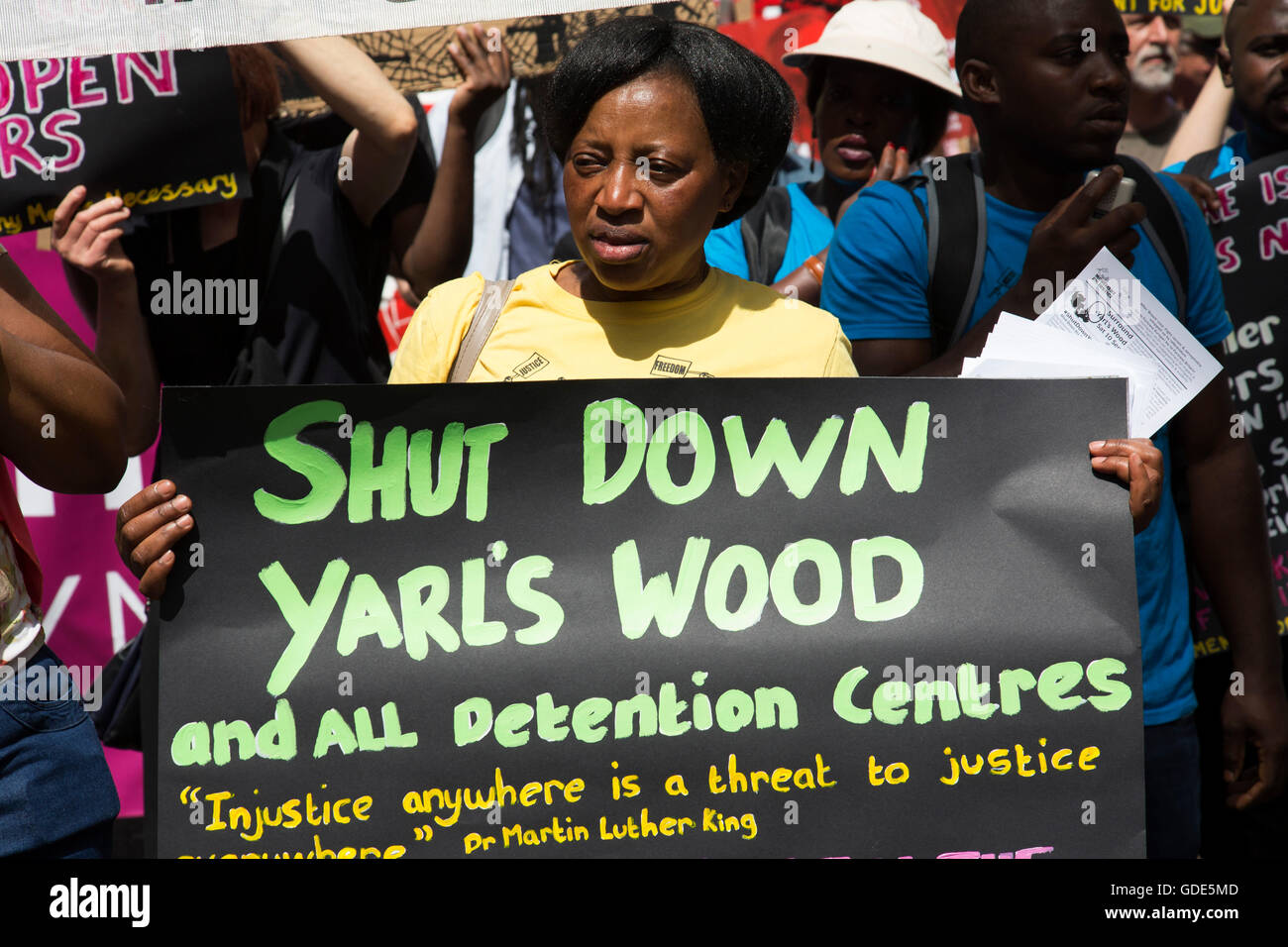 London, UK. 16th July, 2016. Black Lives Matter supporters calling for a shut down of detention centres at the Peoples Assembly demonstration: No More Austerity - No To Racism - Tories Must Go, on Saturday July 16th in London, United Kingdom. Tens of thousands of people gathered to protest in a march through the capital protesting against the Conservative Party cuts. Almost 150 Councillors from across the country have signed a letter criticising the Government for funding cuts and and will be joining those marching in London. Credit:  Michael Kemp/Alamy Live News Stock Photo