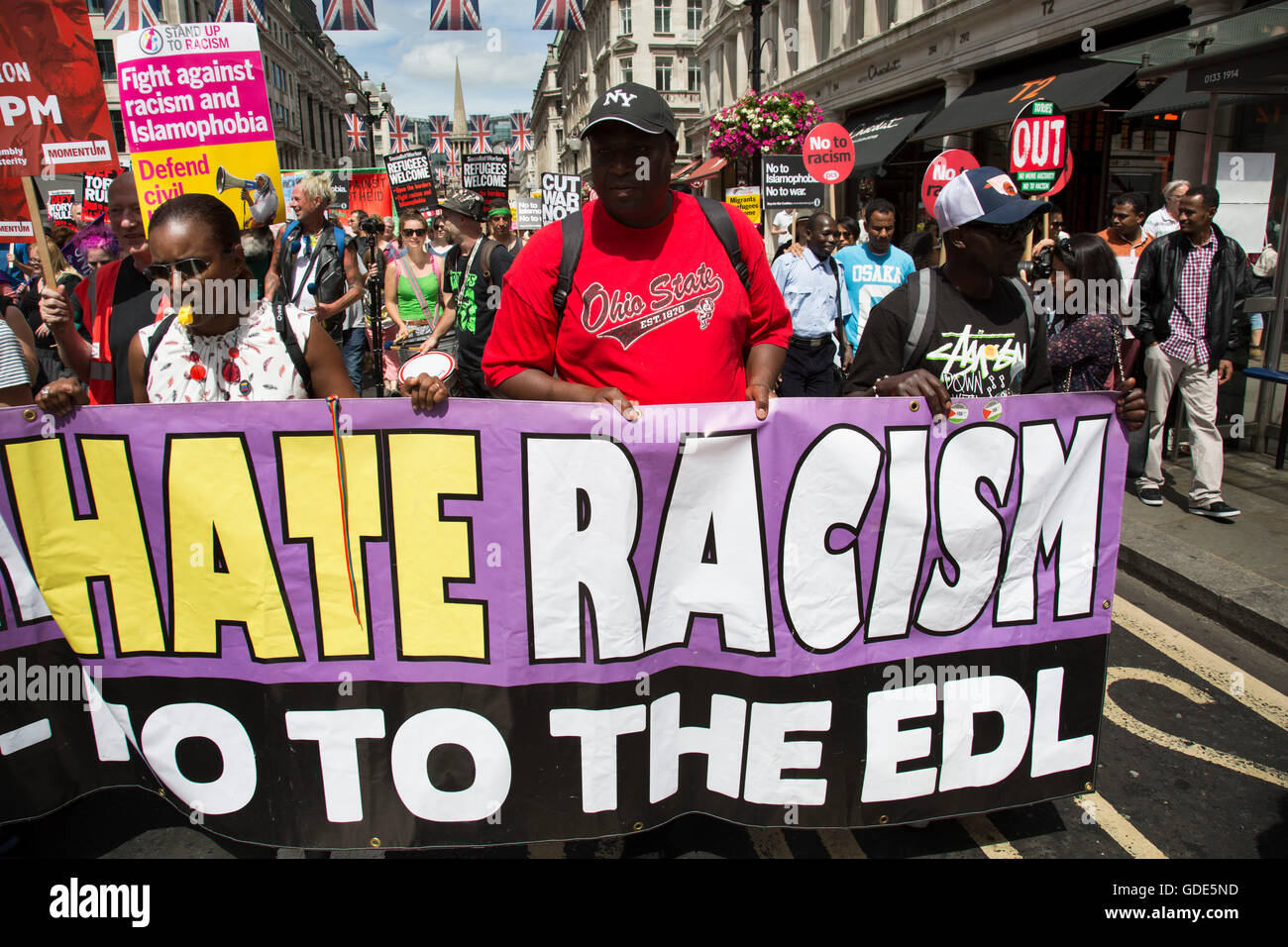 London, UK. 16th July, 2016. Black Lives Matter supporters at the Peoples Assembly demonstration: No More Austerity - No To Racism - Tories Must Go, on Saturday July 16th in London, United Kingdom. Tens of thousands of people gathered to protest in a march through the capital protesting against the Conservative Party cuts. Almost 150 Councillors from across the country have signed a letter criticising the Government for funding cuts and and will be joining those marching in London. Credit:  Michael Kemp/Alamy Live News Stock Photo