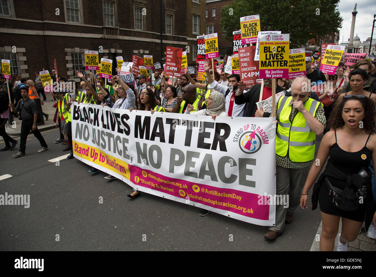 London, UK. 16th July, 2016. Black Lives Matter supporters at the Peoples Assembly demonstration: No More Austerity - No To Racism - Tories Must Go, on Saturday July 16th in London, United Kingdom. Tens of thousands of people gathered to protest in a march through the capital protesting against the Conservative Party cuts. Almost 150 Councillors from across the country have signed a letter criticising the Government for funding cuts and and will be joining those marching in London. Credit:  Michael Kemp/Alamy Live News Stock Photo