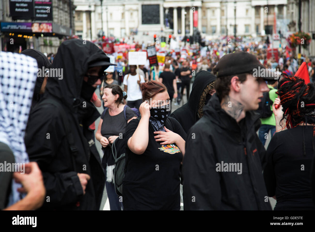 London, UK. 16th July, 2016. A small group of anarchists join the Peoples Assembly demonstration: No More Austerity - No To Racism - Tories Must Go, on Saturday July 16th in London, United Kingdom. Tens of thousands of people gathered to protest in a march through the capital protesting against the Conservative Party cuts. Almost 150 Councillors from across the country have signed a letter criticising the Government for funding cuts and and will be joining those marching in London. Credit:  Michael Kemp/Alamy Live News Stock Photo
