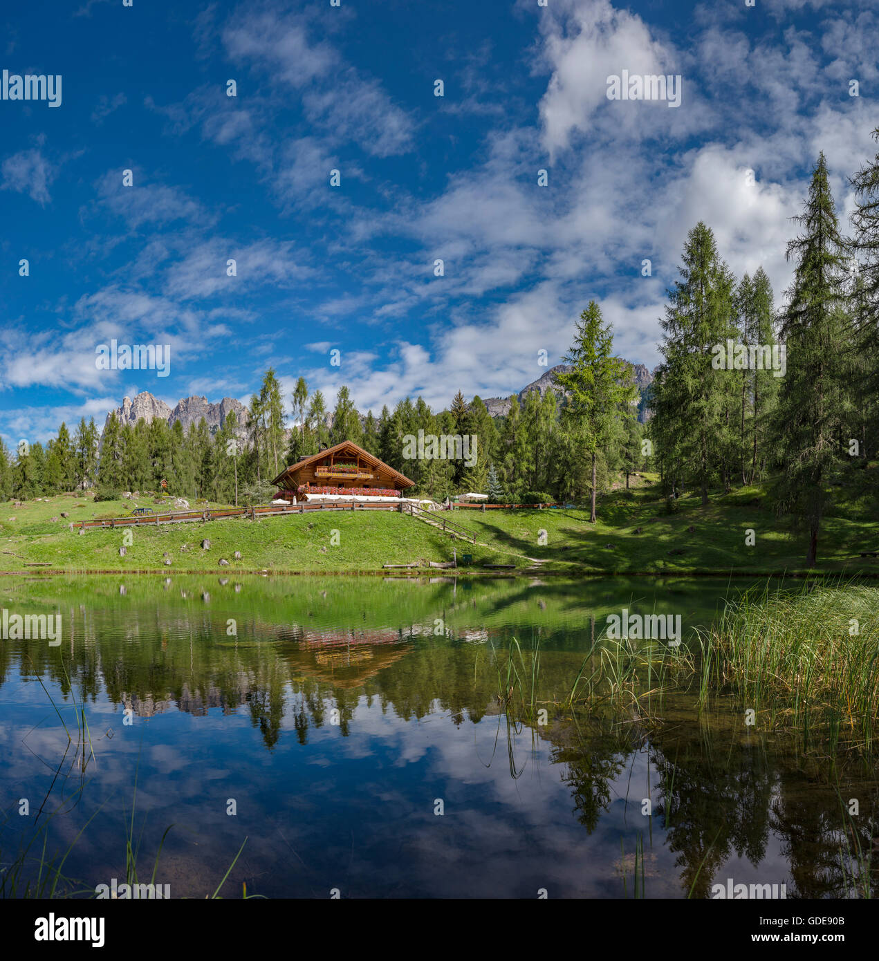 Cortina d’Ampezzo,Italia,Restaurant reflected in Lago Scin Stock Photo