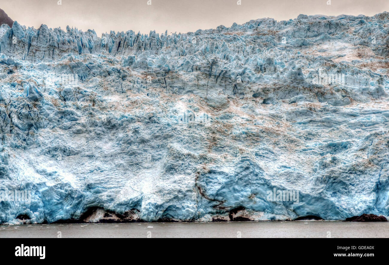Columbia Glacier,glacier,glacier tongue,calving,glacier,sea,Serac,Seracs,crevasses,USA,Alaska,sea,water,clouds,blu Stock Photo