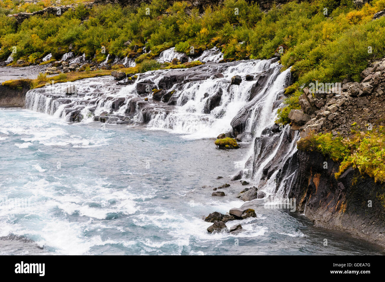 The waterfalls Hraunfossar of the river Hvita near the village Husafell in west Iceland. Stock Photo