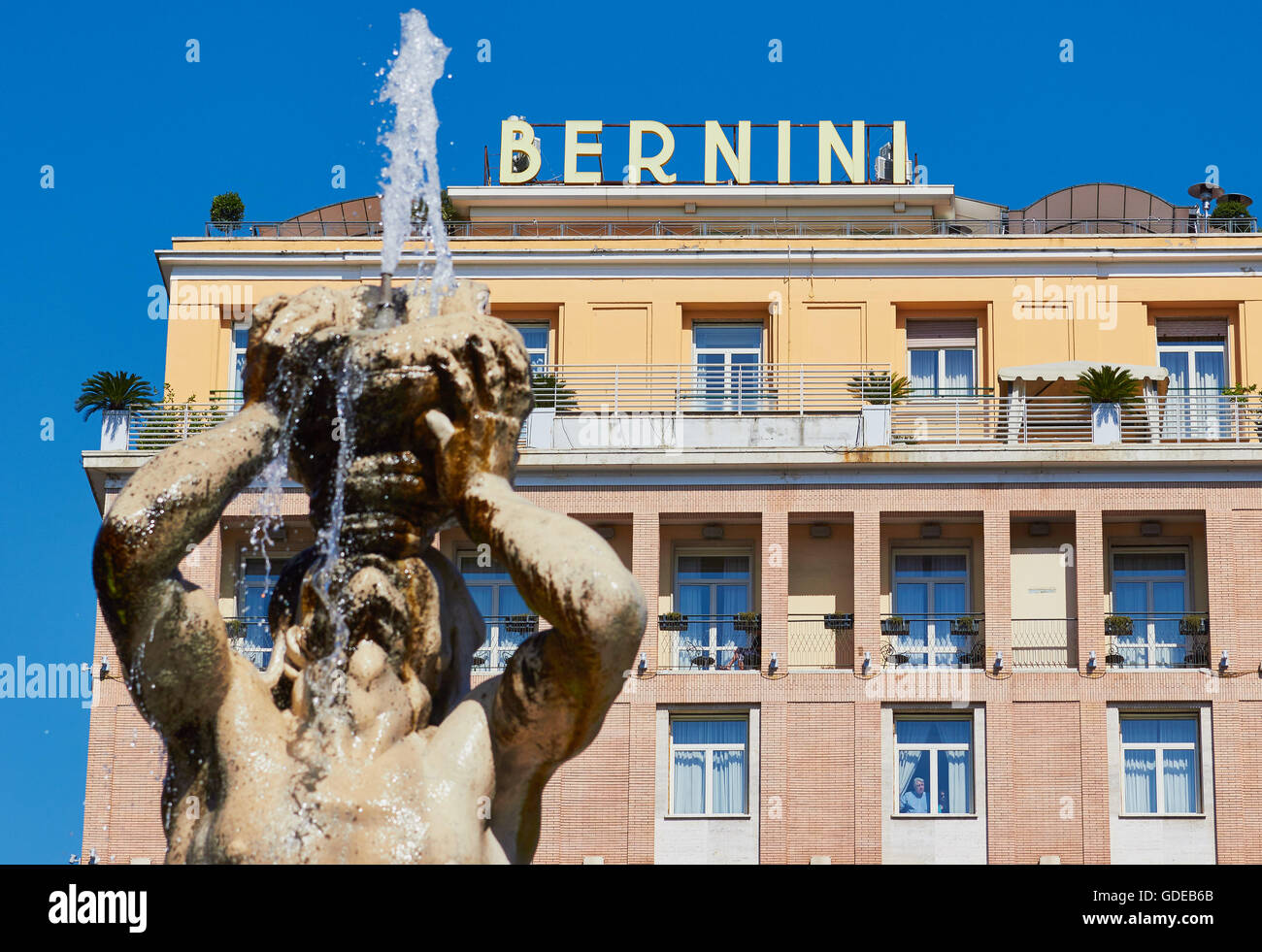 Five star Hotel Bernini and Fontana Del Tritone by Bernini Piazza Barberini Rome Lazio Italy Europe Stock Photo