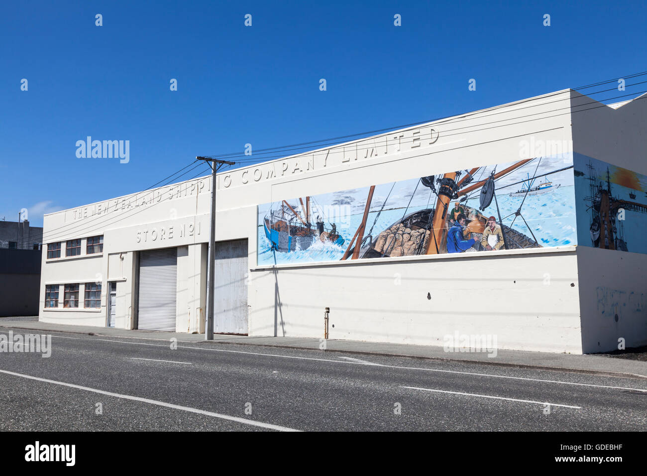 New Zealand Shipping Company warehouse with murals, Bluff, New Zealand