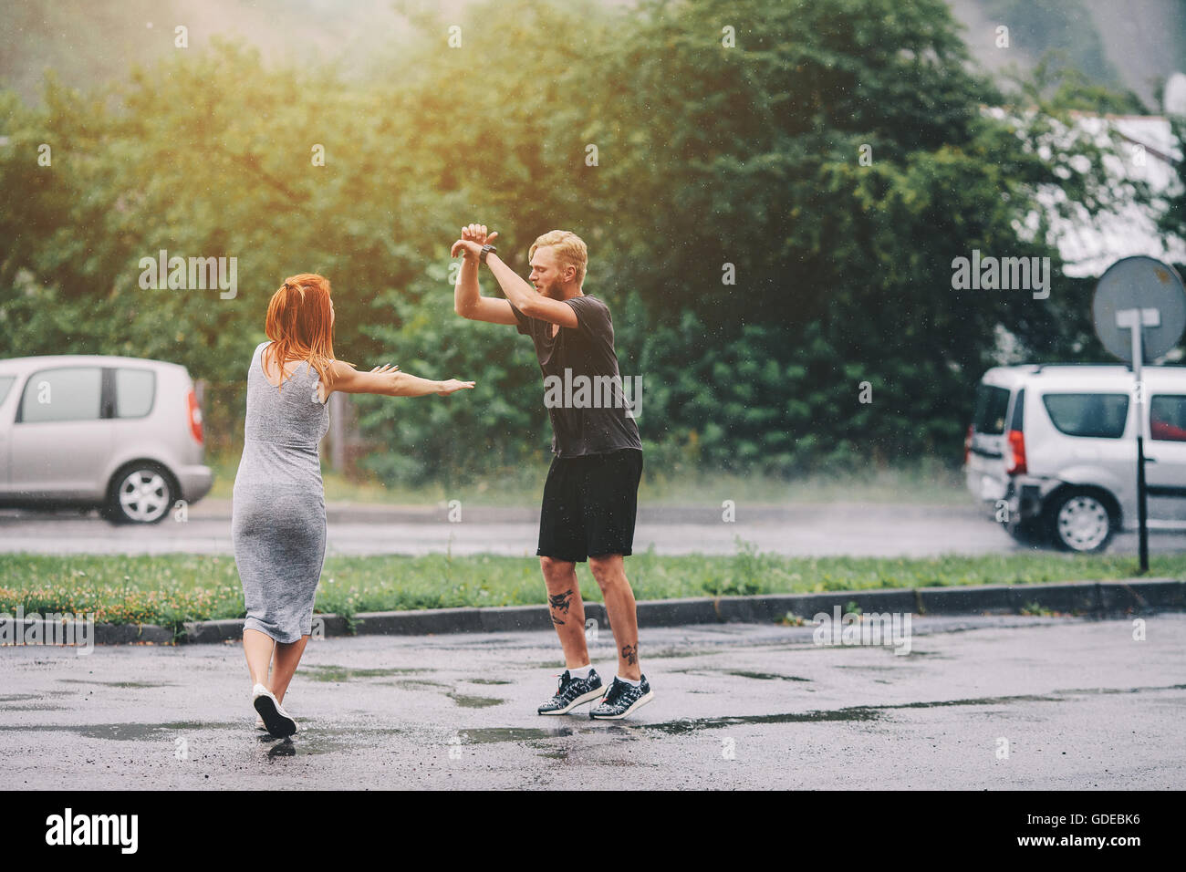 beautiful couple in the rain Stock Photo - Alamy