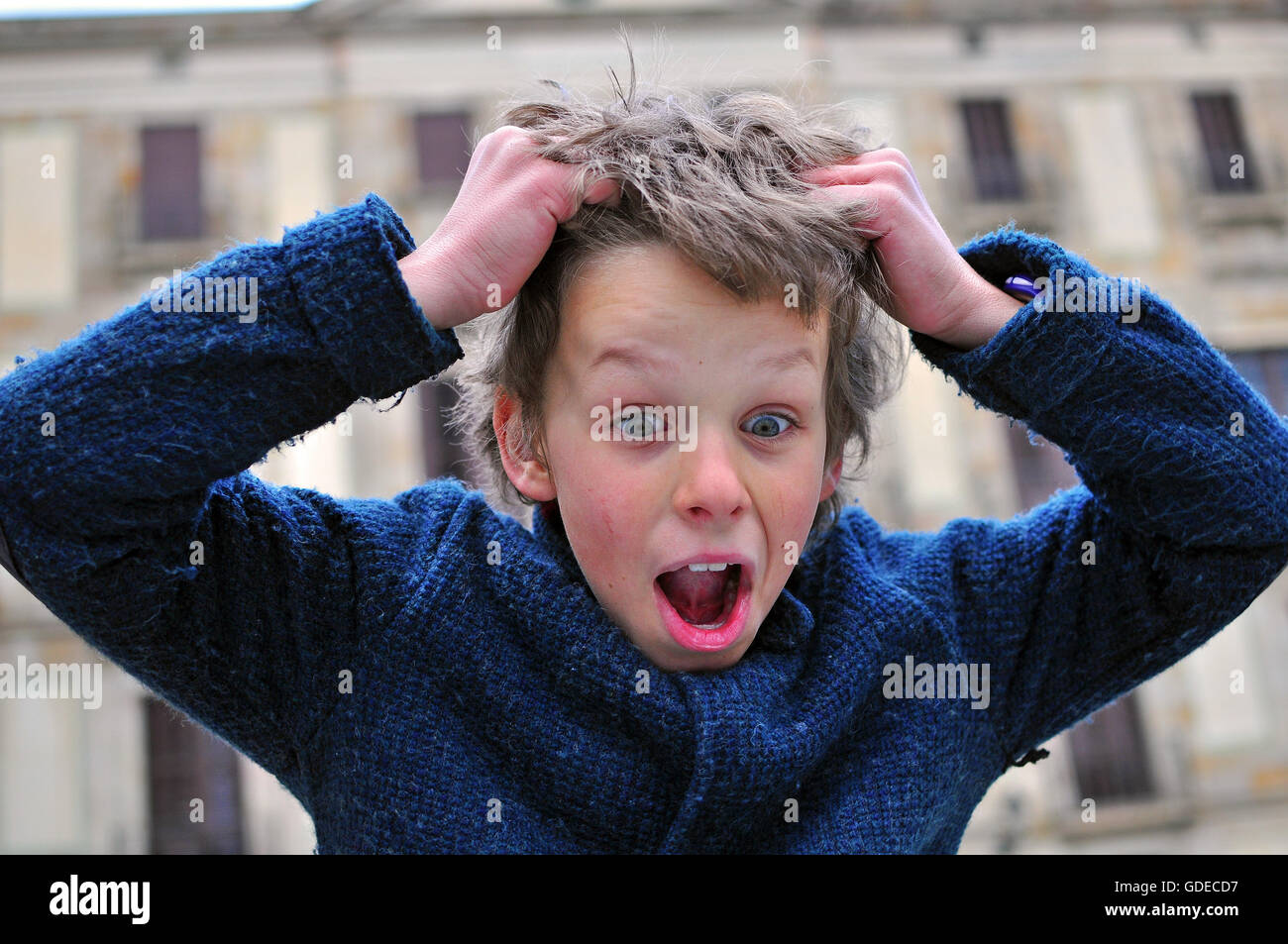 Surprised boy with a wide eyes Stock Photo