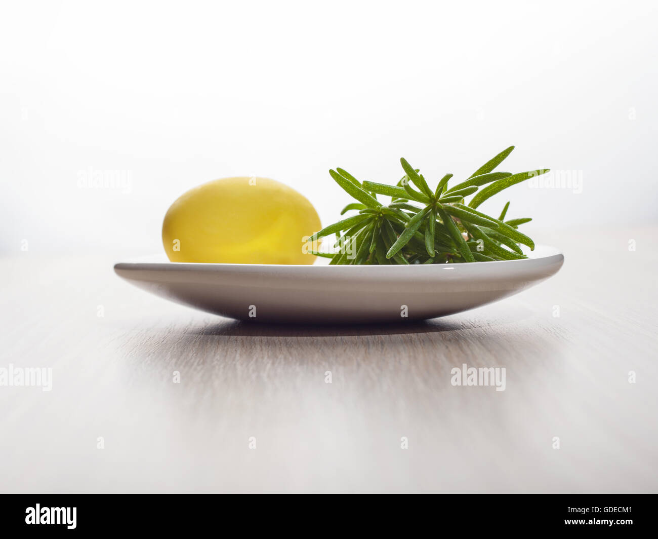 Bathroom accessories, shampoo, herbs, lemon shaped soap Stock Photo Alamy