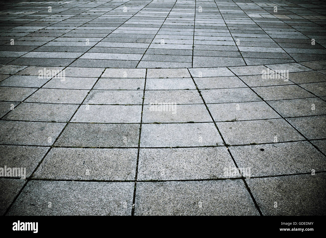 pavement made of squared tiles Stock Photo