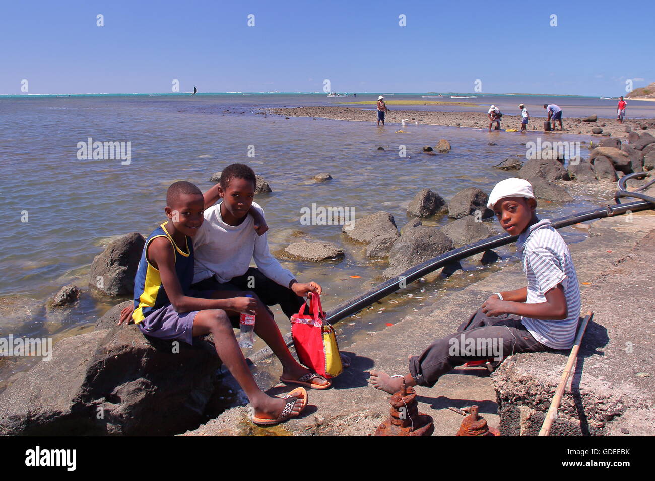 Octopus fishing, Three local boys posing, Rodrigues Island