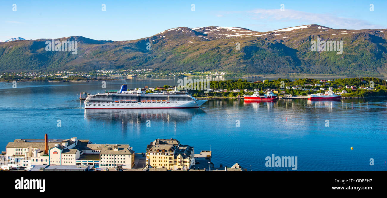 Panoramic view of Cruise Ship from Mt. Aksla with mountain backdrop,Outer Fjord of Alesund, Norway, More og Romsda, Scandanavia, Stock Photo