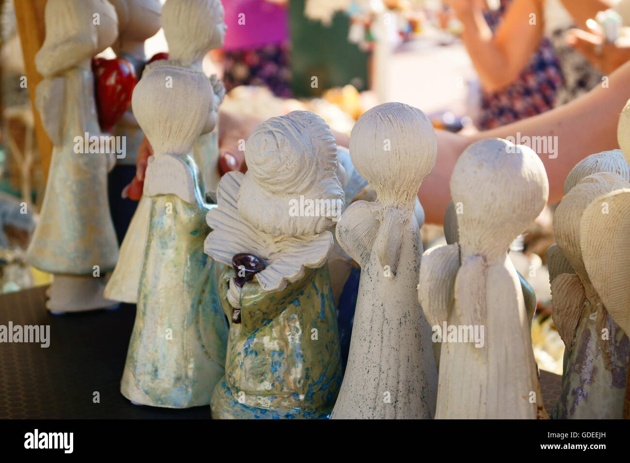 the figurines of angels on outdoor marketplace the fair organized by the city festival in - Christmas Angels For Sale the figurines of angels on outdoor marketplace the fair organized by the city festival in - Christmas Angels For Sale