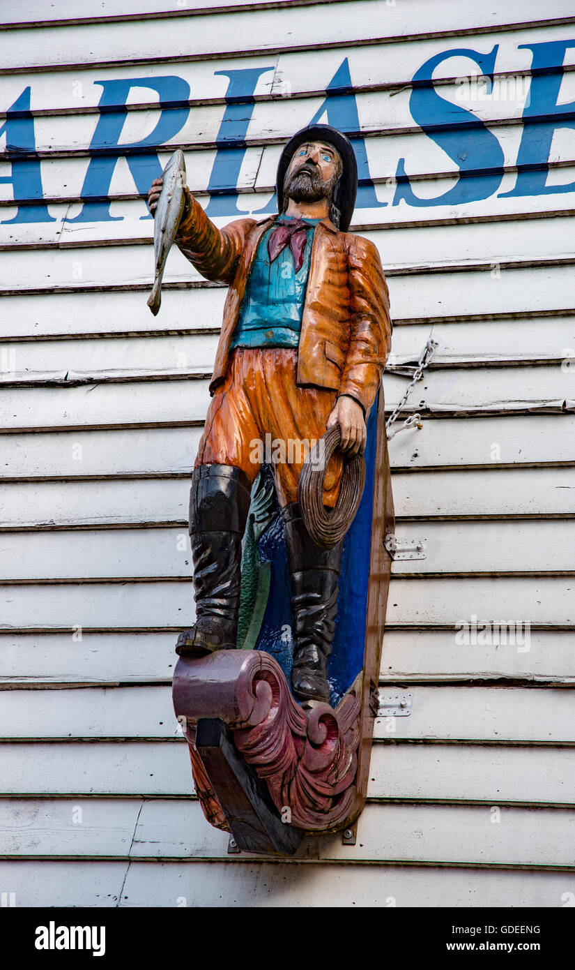 Wooden Fisherman Statue at the entrance of the Bergen Fish Market, Bergen, Norway, Hordaland, Scandinavia Stock Photo