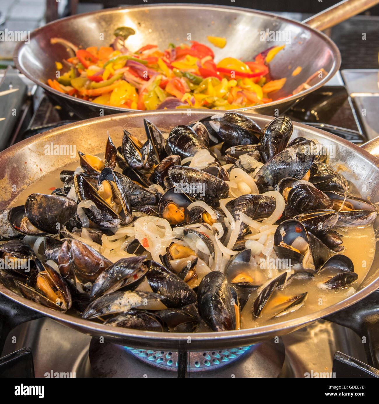 Fresh Mussels and condiments being prepared for touists at the Famous Bergen Fish Market, Bergen, Norway ,Hordaland, Scandanavia Stock Photo
