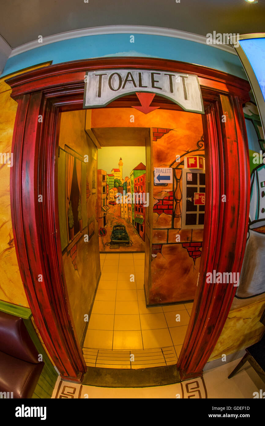 Bathrooms,Toilets,Toaletts,colorful toilet entrance to bathroom in restaurant. Scandinavia, Europe, European Stock Photo