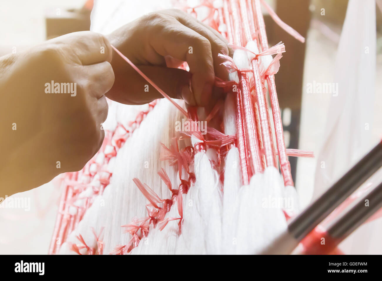 Thread In Rope Plastic rope tied on thread by handmade, old folk way silk thread ...