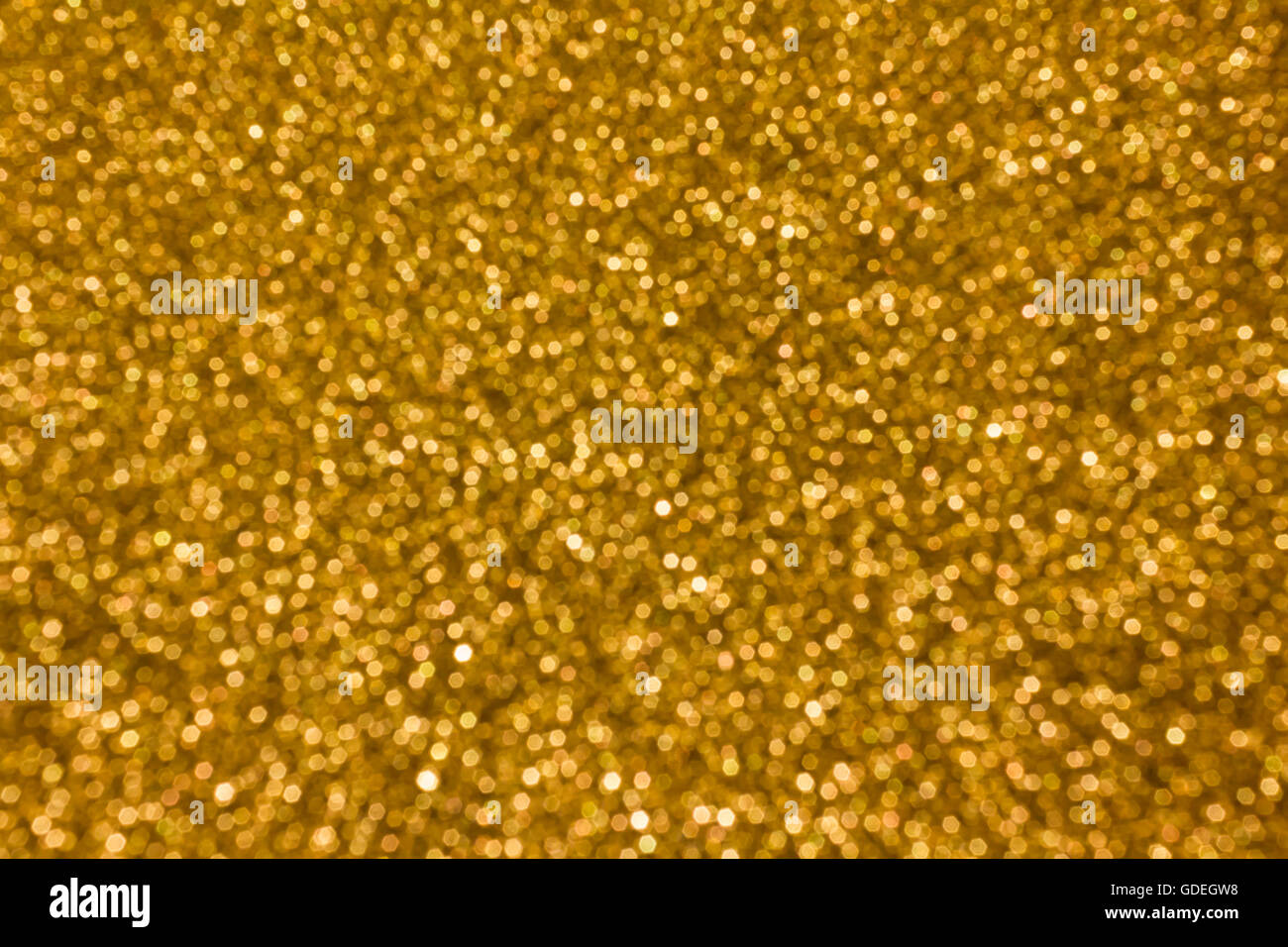 Colourful spark and glow colourful shining bokeh light in golden colour