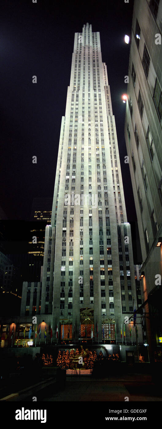 Rockefeller Plaza ('30 Rock') photographed in vertical panorama that includes the entire building from base to top. Stock Photo